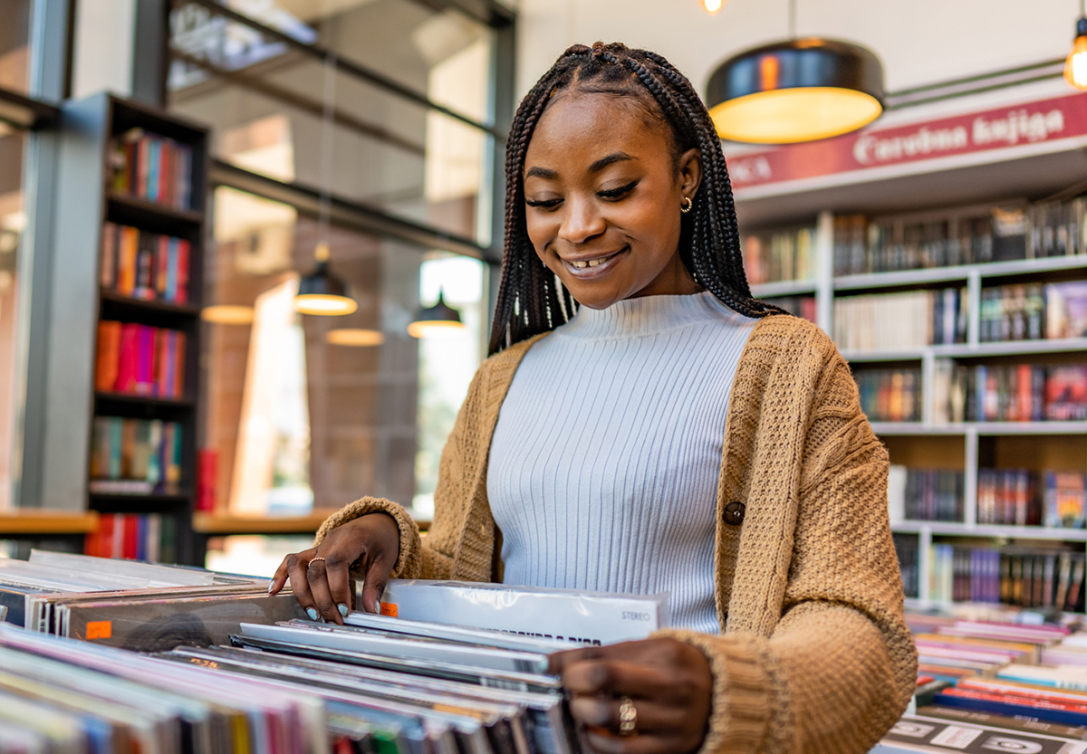 woman searching through records